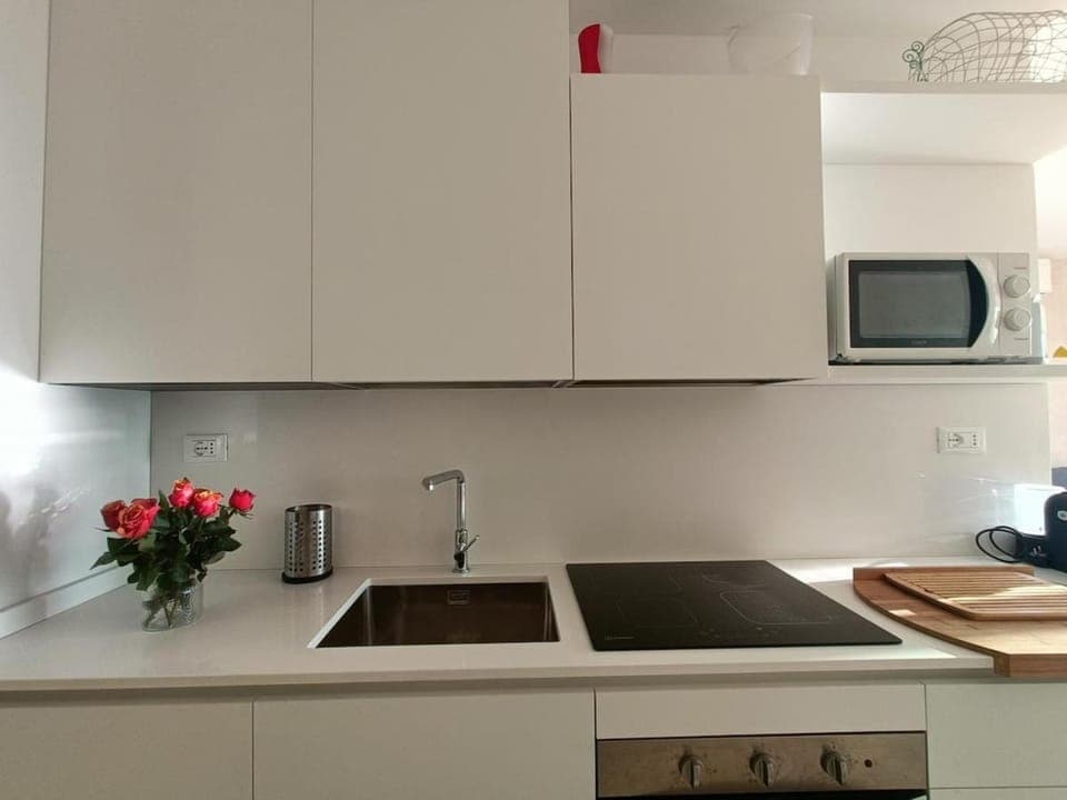 Kitchen or kitchenette, stove