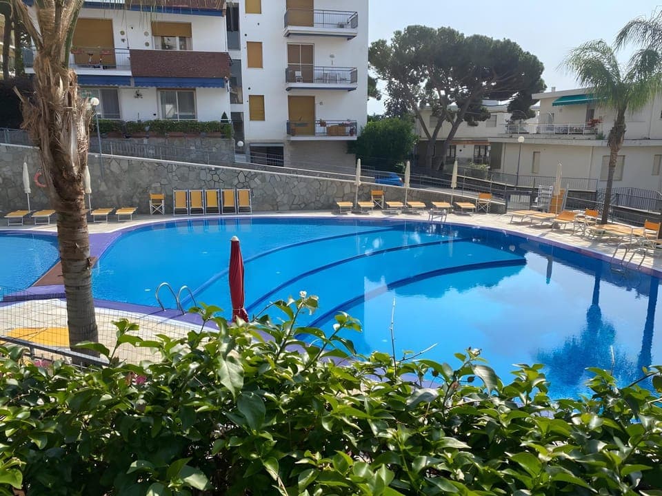 Property building, Living room, Swimming pool