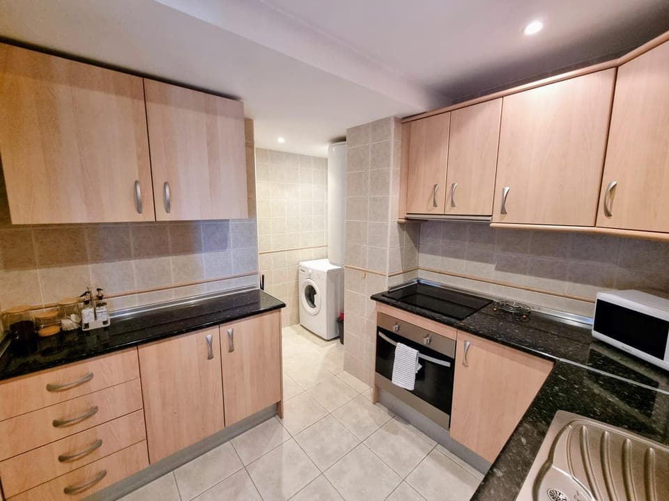 Kitchen or kitchenette, oven