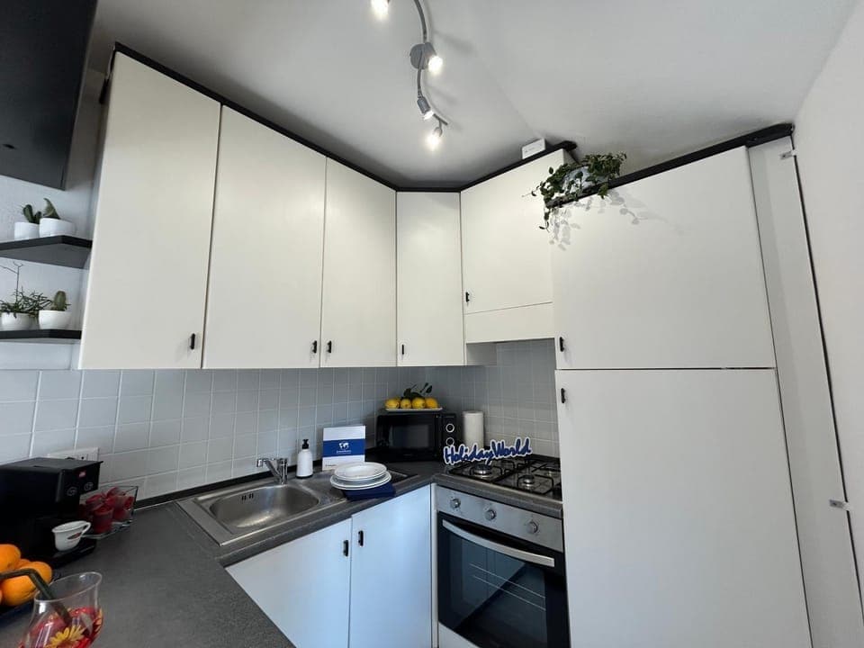 Kitchen or kitchenette, oven, stove