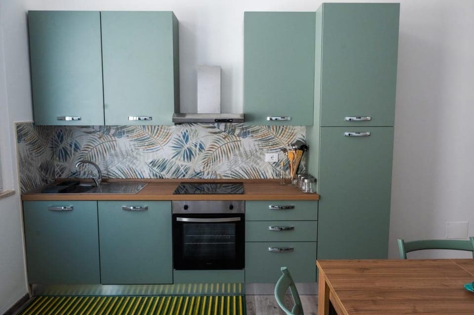 Kitchen or kitchenette, oven, stove