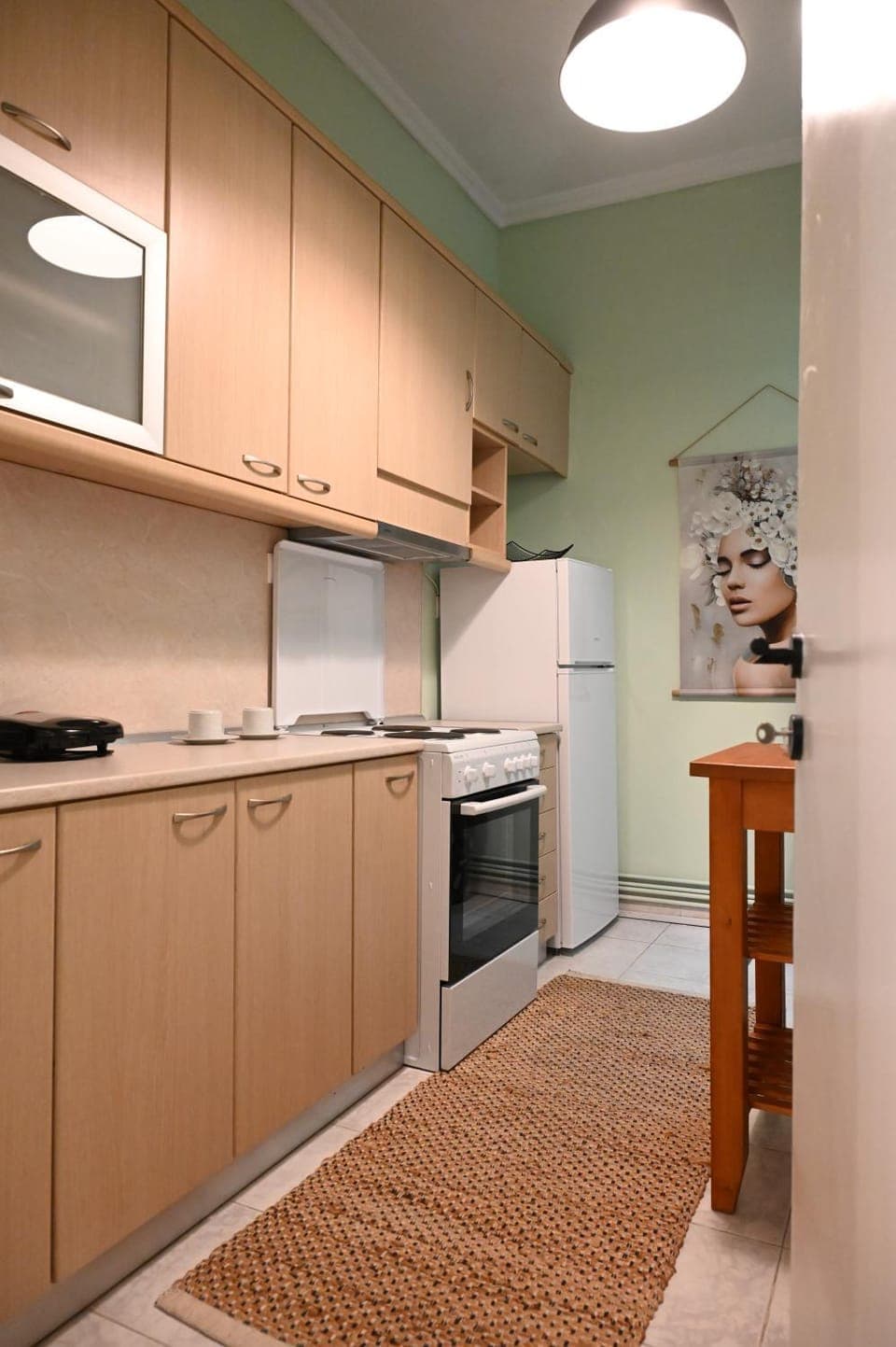 Kitchen or kitchenette, oven, stove