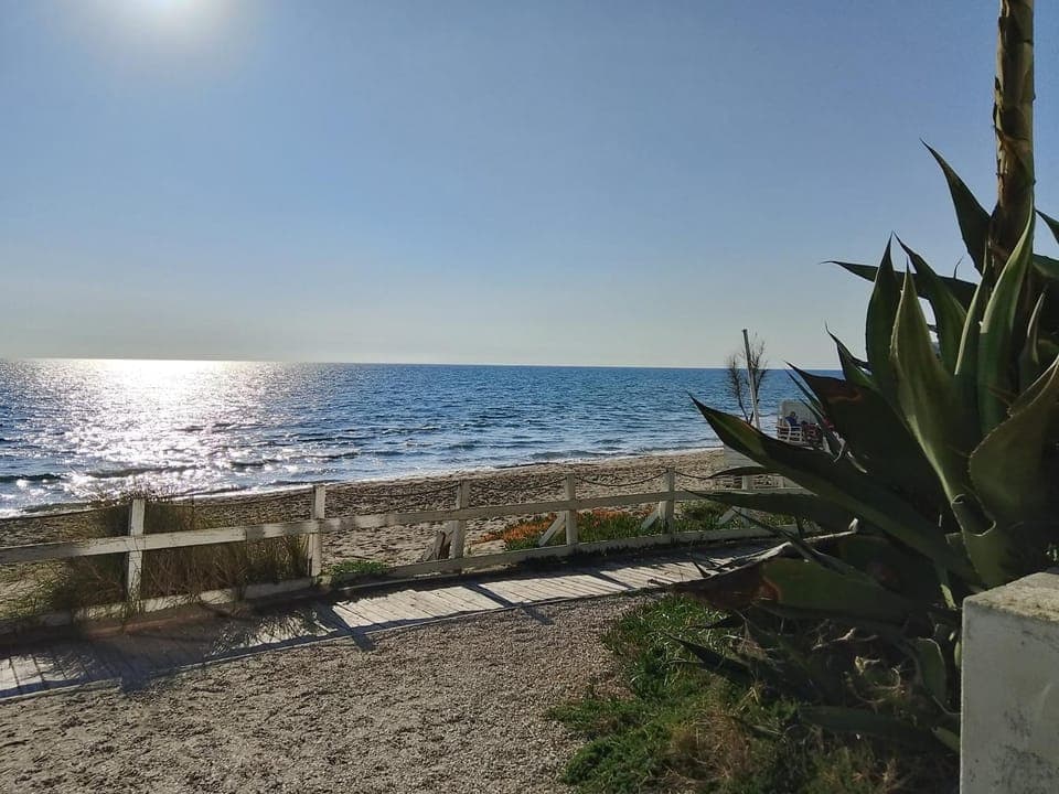Nearby landmark, Day, Natural landscape, Beach