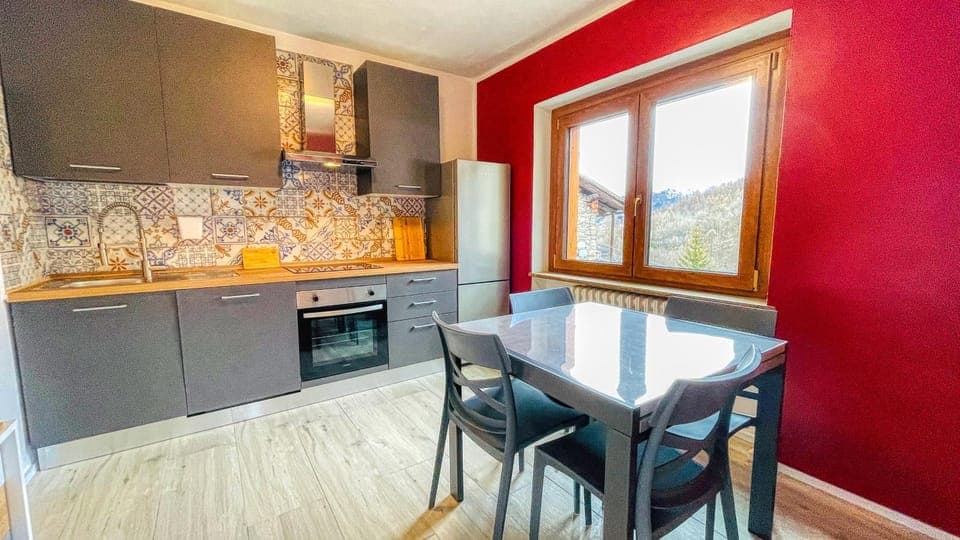 Kitchen or kitchenette, dishwasher, oven, stove