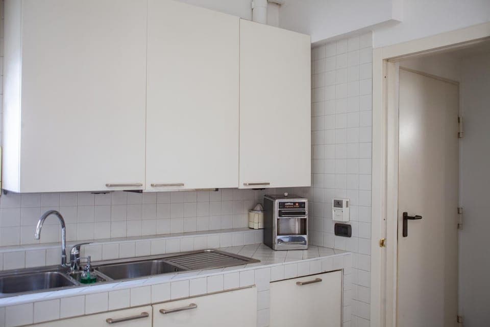 Kitchen or kitchenette, stove