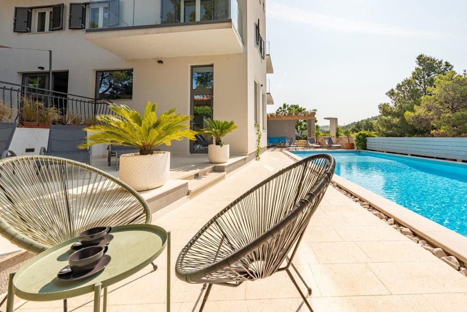 Property building, Seating area, Pool view