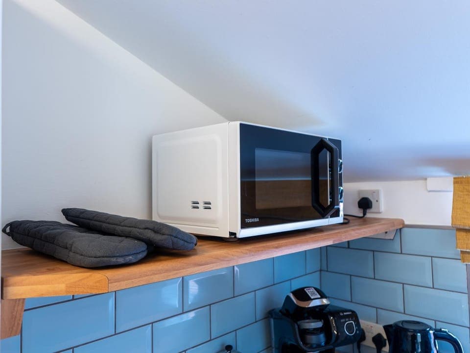 Kitchen or kitchenette, microwave