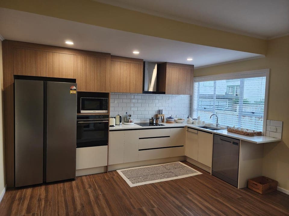 Kitchen or kitchenette, dishwasher, oven, stove