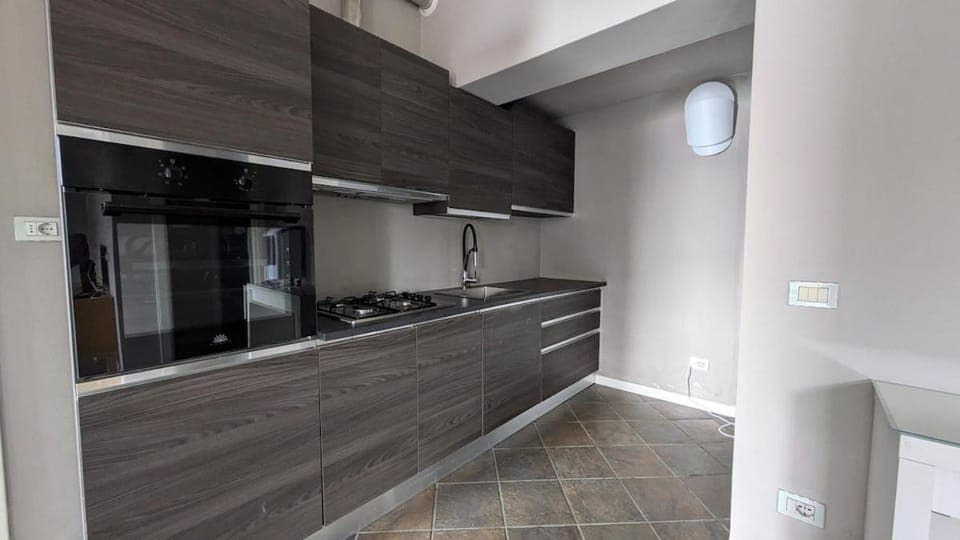 Kitchen or kitchenette, stove