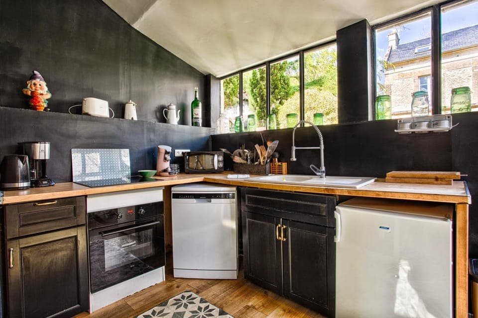 Kitchen or kitchenette, dishwasher, oven, stove