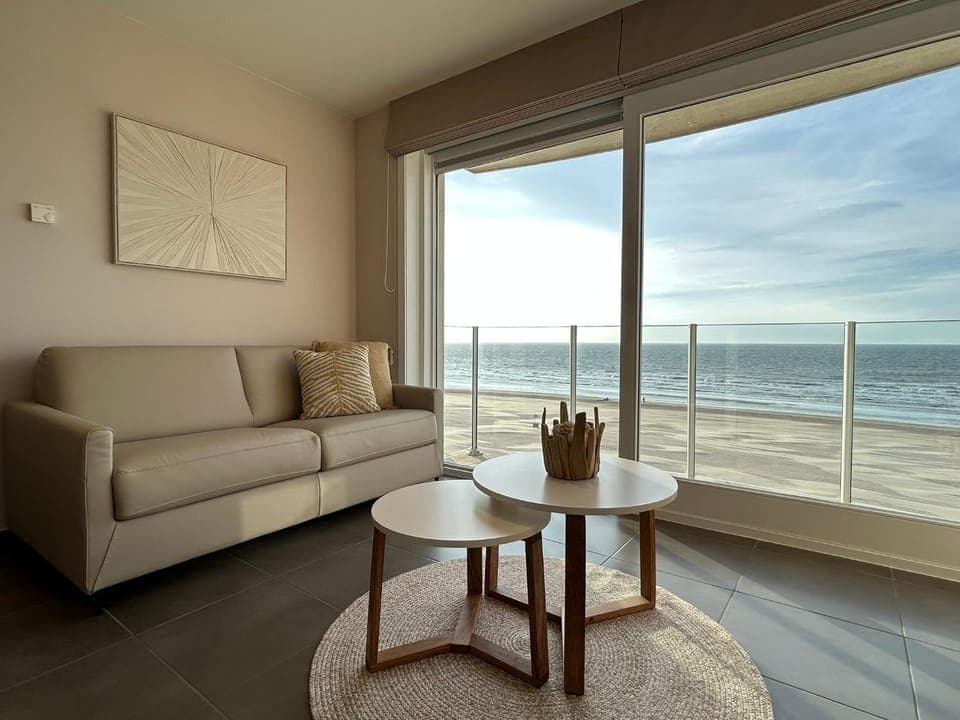 View (from property/room), Living room, Seating area, Beach, Sea view