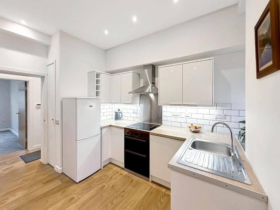 Kitchen or kitchenette, oven, stove