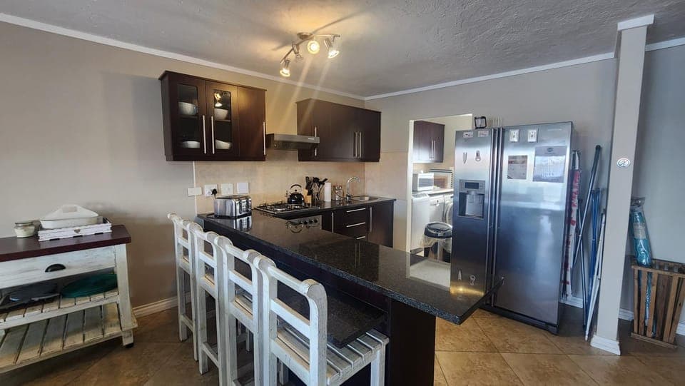 Kitchen or kitchenette, oven, stove, toaster