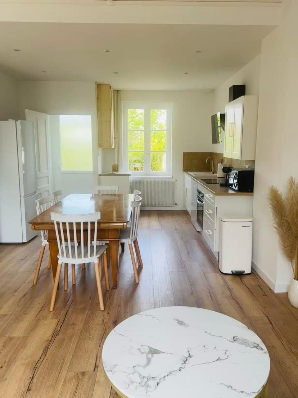 Kitchen or kitchenette, dishwasher, oven, stove, toaster