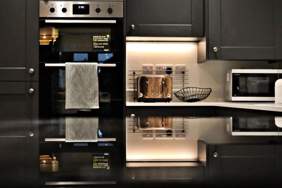 Kitchen or kitchenette, oven, toaster