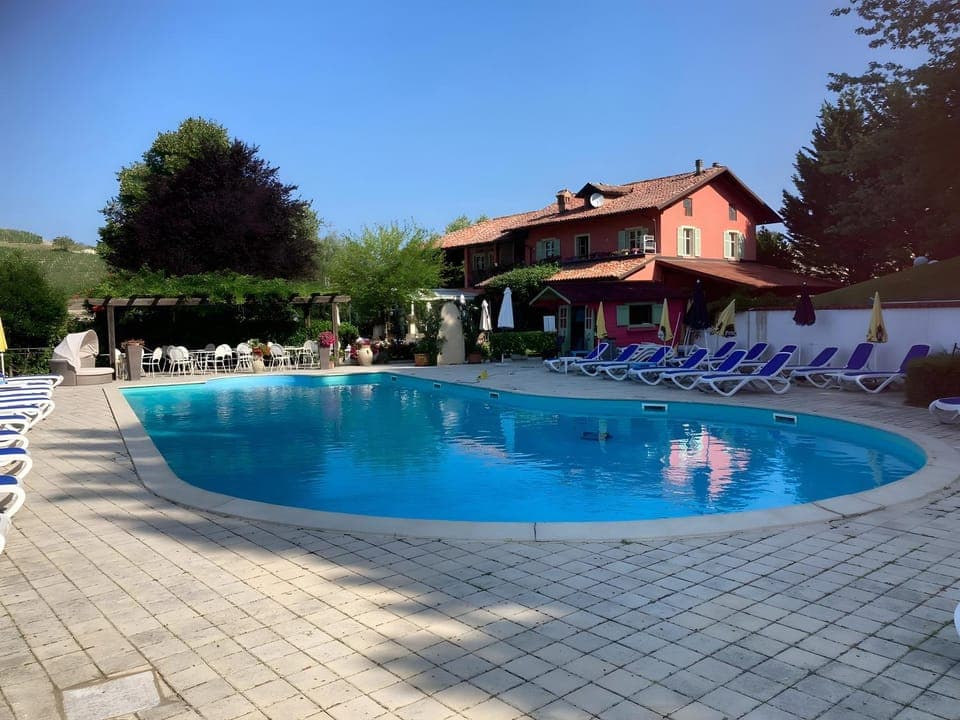 Property building, Living room, Swimming pool