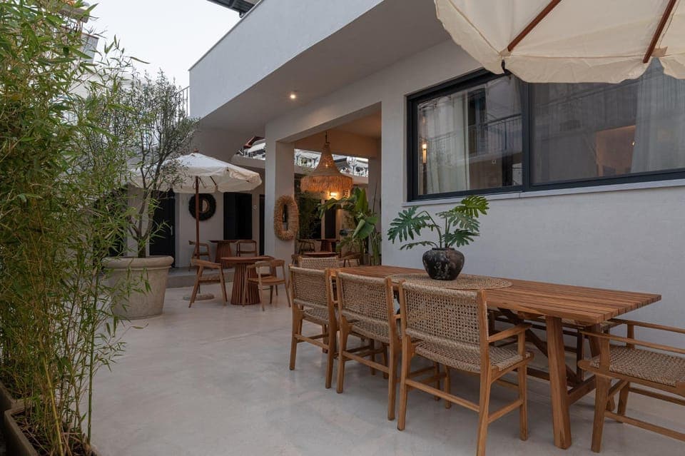 Property building, Patio, Day, Garden, View (from property/room), Living room, Seating area, Dining area, Inner courtyard view