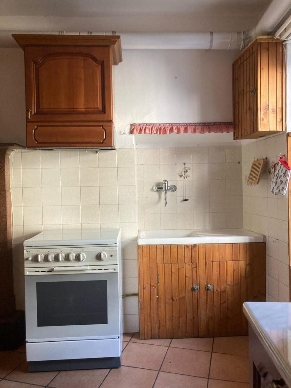 Kitchen or kitchenette, stove