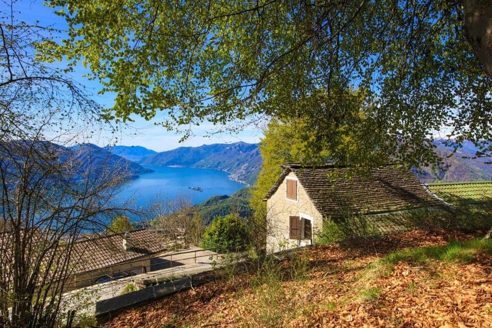 Property building, Natural landscape, Lake view, Mountain view