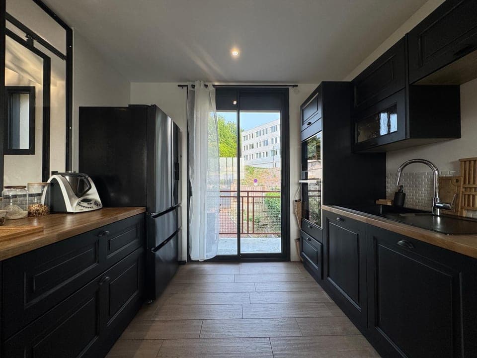 Kitchen or kitchenette, dishwasher, oven, stove, toaster