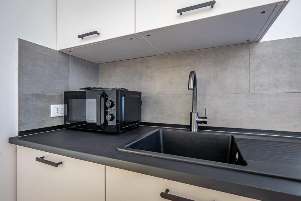 Kitchen or kitchenette, stove