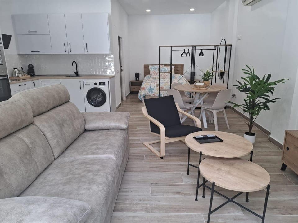 Kitchen or kitchenette, Living room, Seating area, Dining area, oven, washing machine, air conditioner