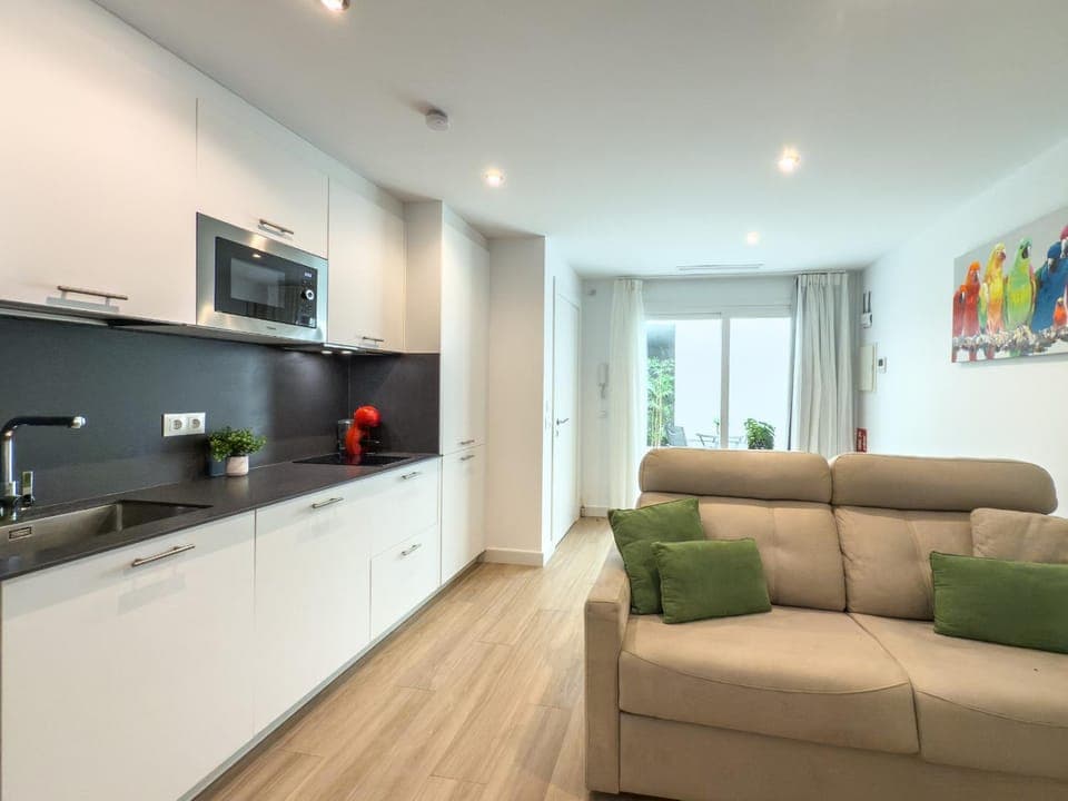 Kitchen or kitchenette, Living room, Seating area, stove