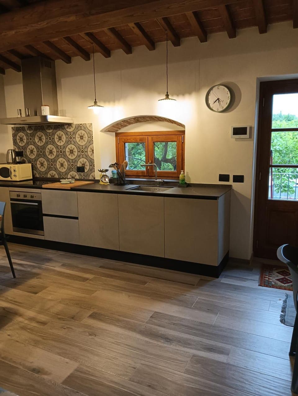 Kitchen or kitchenette, dishwasher, microwave, oven