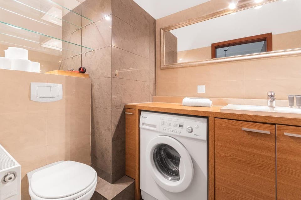 Shower, Toilet, Bathroom, towels, washing machine, dryer