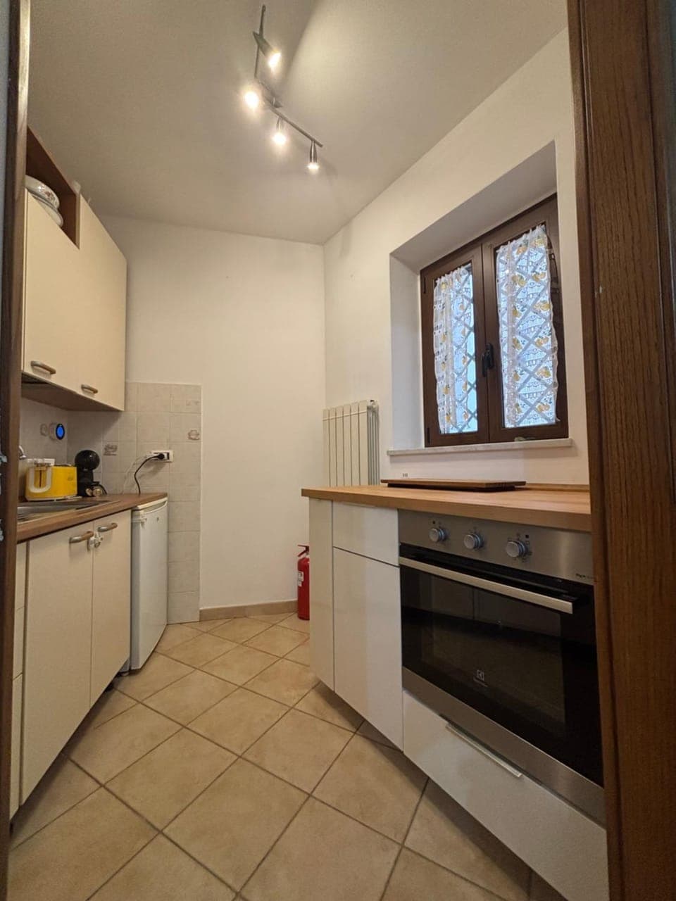 Kitchen or kitchenette, oven, stove