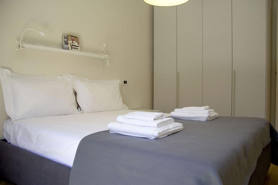 Nearby landmark, Bed, Day, Library, Library, TV and multimedia, Decorative detail, Decorative detail, Bedroom, Landmark view, Landmark view, Time of day, furniture, furniture, hair dryier, heating, heating, internet, internet, towels, towels, wardrobe, air conditioner, air conditioner