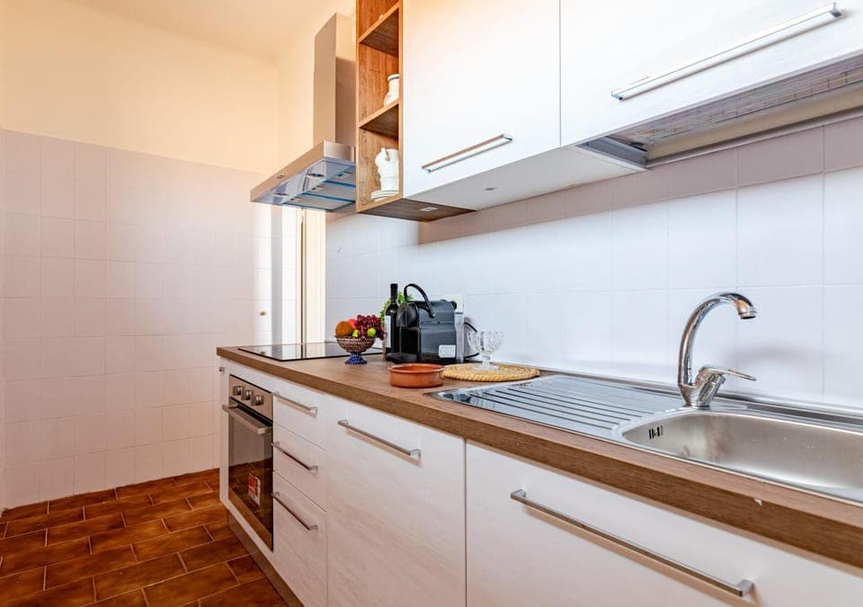 Kitchen or kitchenette, stove