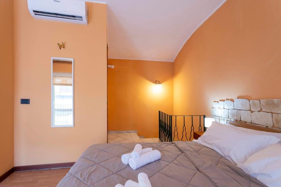 Bed, Photo of the whole room, Bedroom, towels, air conditioner