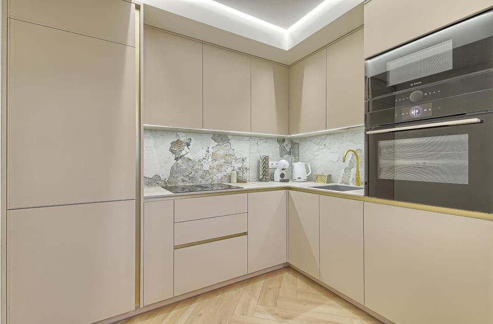 Kitchen or kitchenette, dishwasher, oven, stove