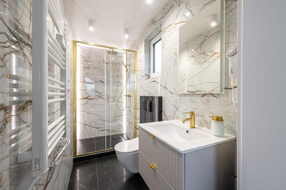 Shower, Bathroom, hair dryier, towels