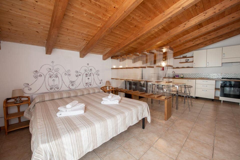 Bed, Kitchen or kitchenette, Dining area, towels