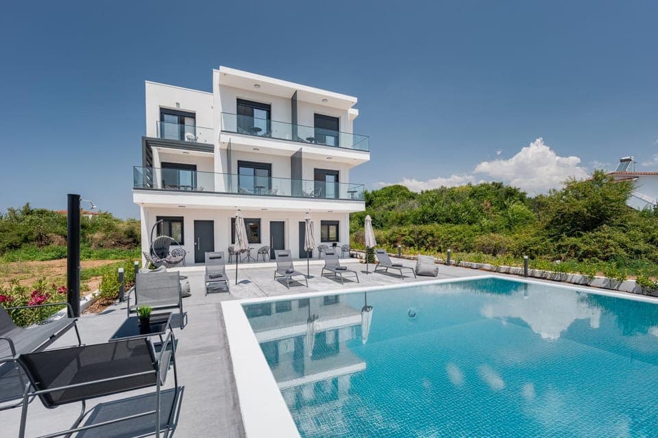 Property building, Pool view, Swimming pool, sunbed