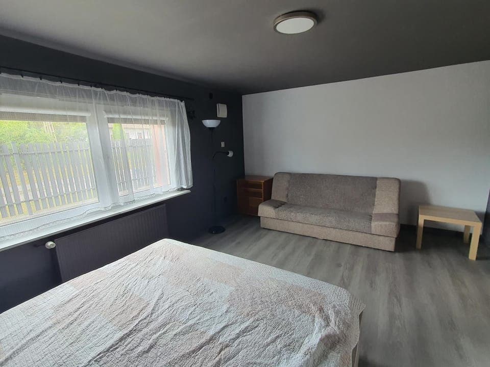 Bed, Living room, Seating area, Bedroom