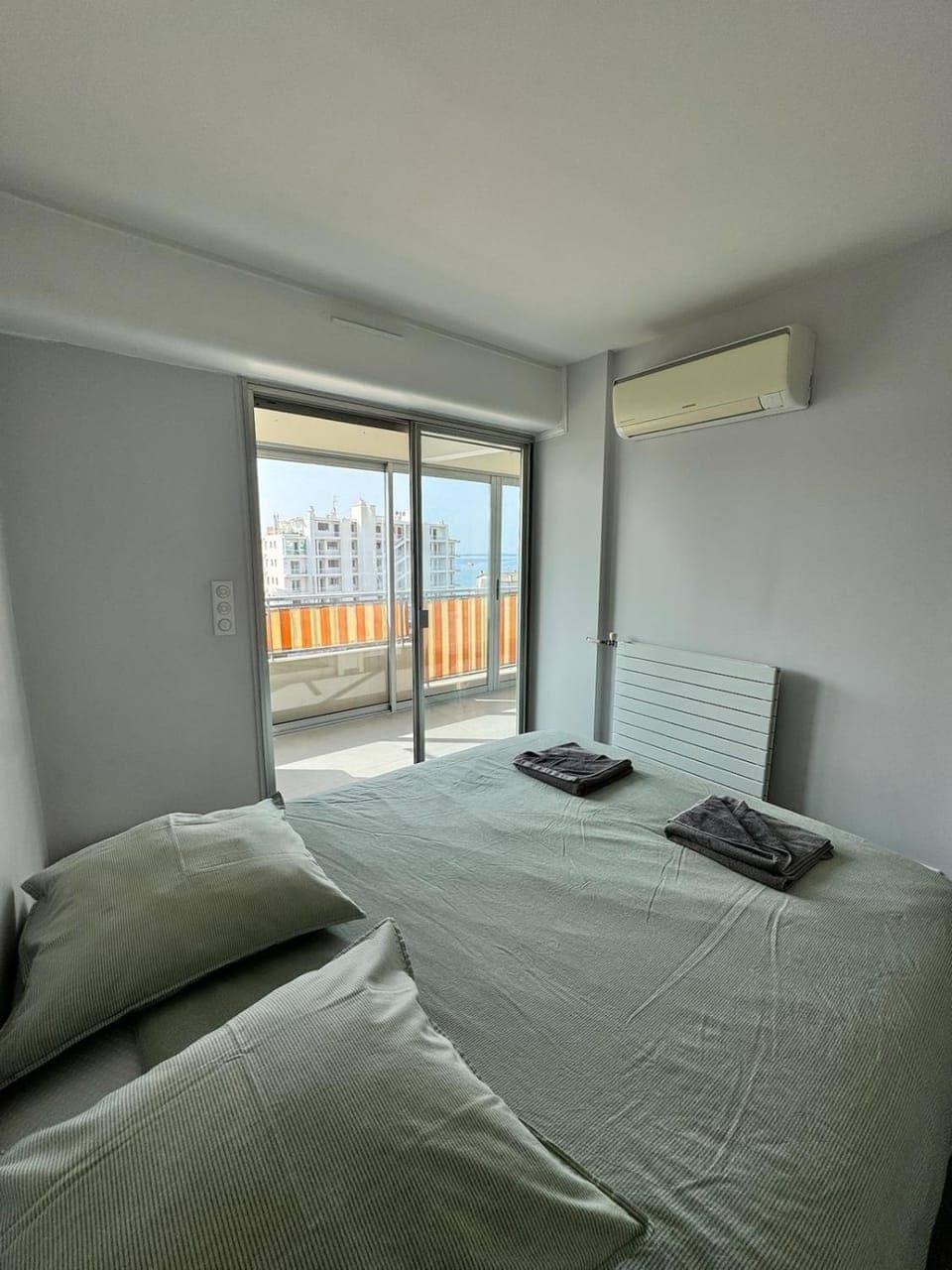 Bed, Photo of the whole room, Bedroom, towels, air conditioner