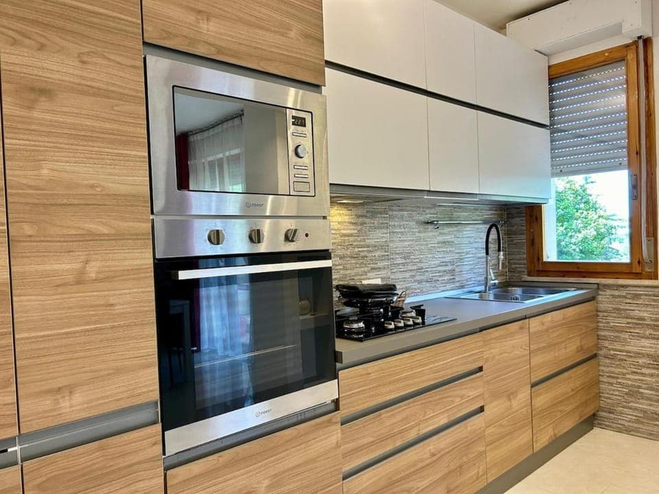 Kitchen or kitchenette, oven, stove