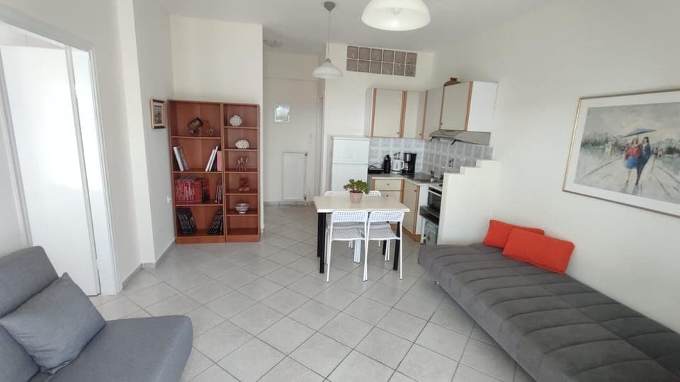 Kitchen or kitchenette, Living room, Seating area, Dining area, stove, air conditioner