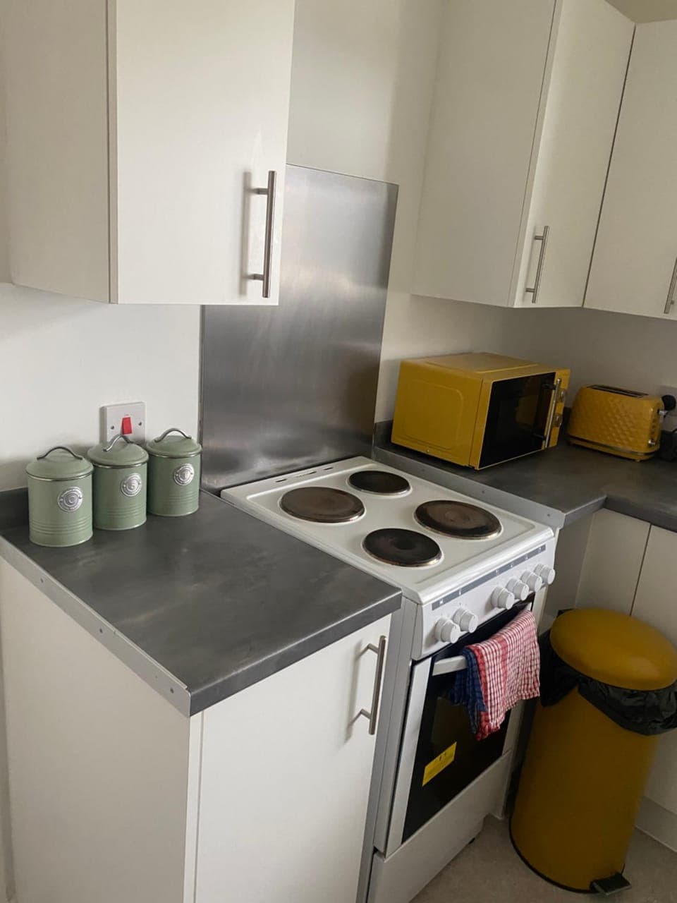 Kitchen or kitchenette, oven, stove, toaster