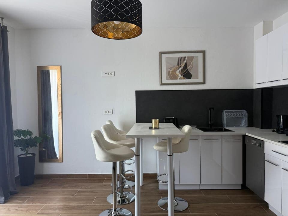 Kitchen or kitchenette, Dining area, dishwasher, stove, toaster