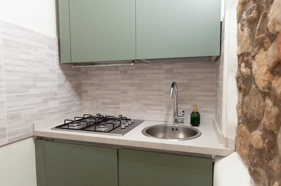 Kitchen or kitchenette, stove