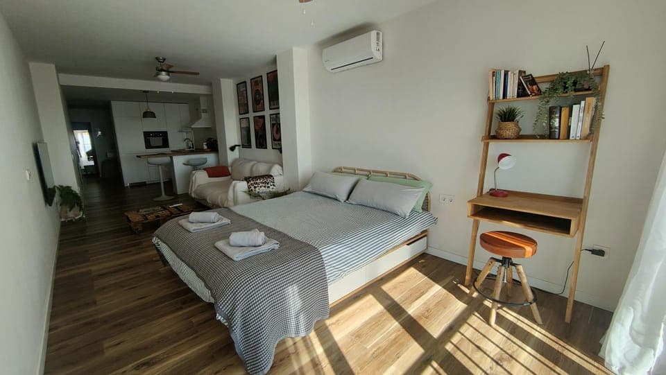 Photo of the whole room, Seating area, Bedroom, towels, air conditioner