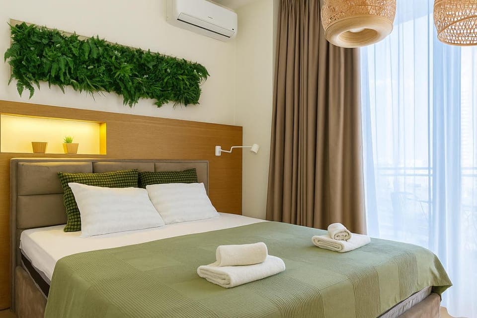 Bed, Photo of the whole room, Bedroom, towels, air conditioner