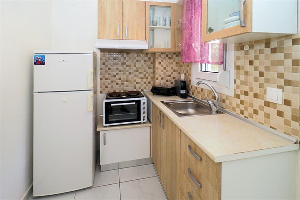 Kitchen or kitchenette, stove