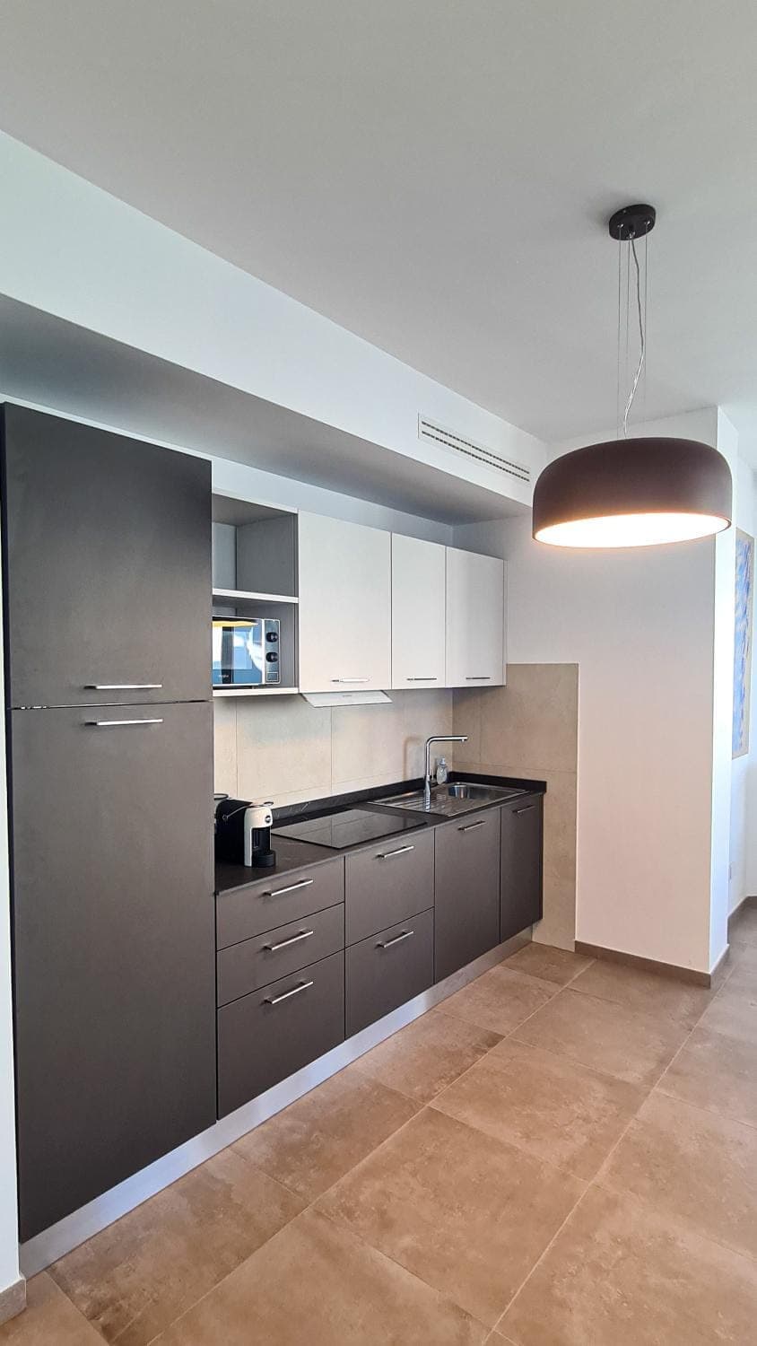 Kitchen or kitchenette, oven, stove