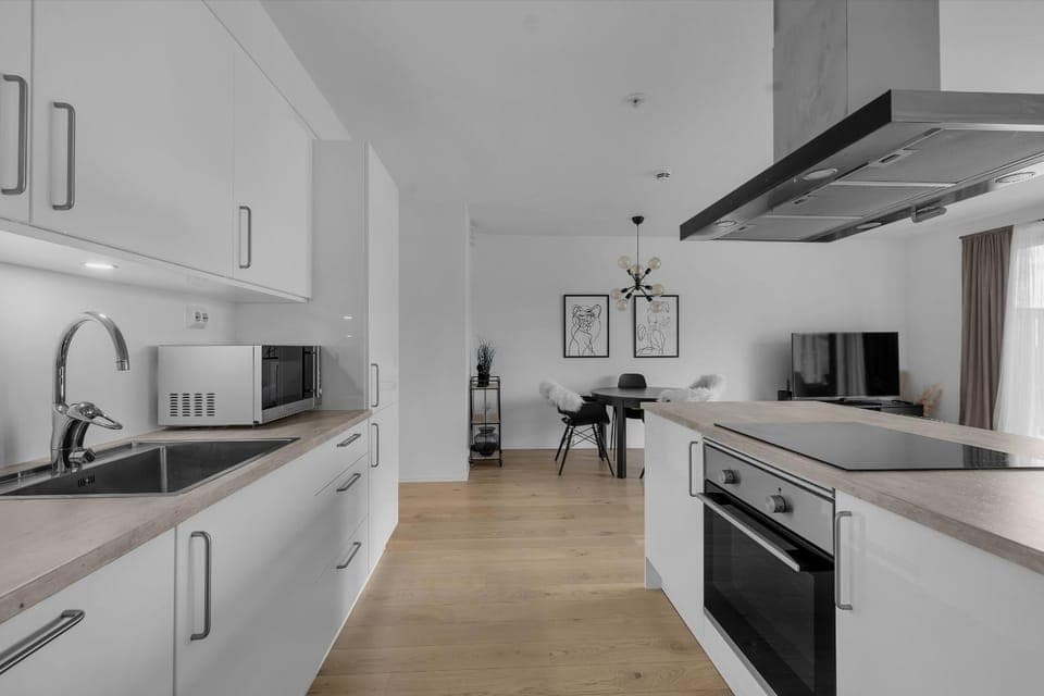 Kitchen or kitchenette, dishwasher, microwave, oven, stove