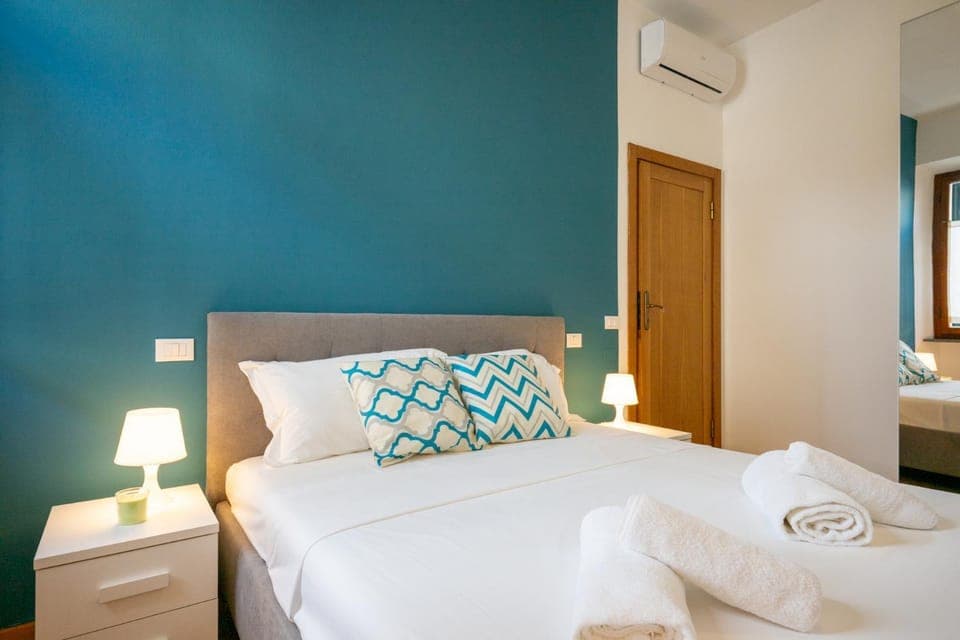 Bed, Photo of the whole room, Bedroom, towels, air conditioner